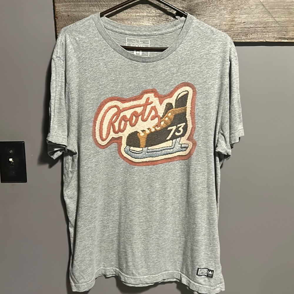 Vintage Roots Hockey skate patch shirt.